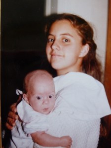 J holding K, 1992