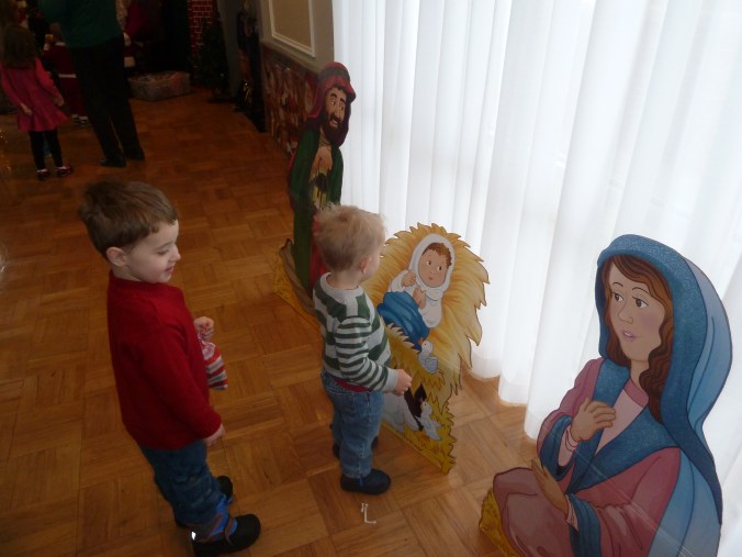 Would you believe that moments after this picture was taken, they dropped to the floor and started wrestling? At church? In front of the HOLY FAMILY?